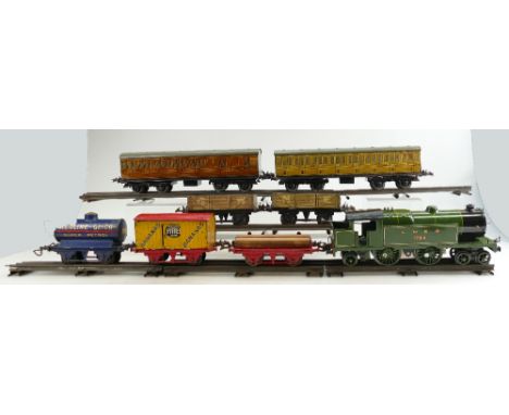 Hornby 4,4,2 LNER 1784 tinplate 20v electric O gauge model train together with 12530 x2 Goods trucks, 845/10352 Carriages, Re