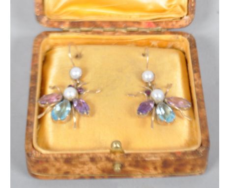 A pair of insect drop earrings set with pearls, amethyst and topaz and finished with cabochon ruby eyes. No hallmark - stampe