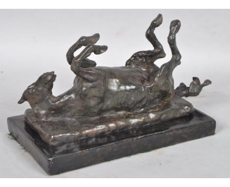 After D Montagu, a horse rolling, patinated bronze, numbered 2/9 on plinth base 16cm high overall, 28cm long 2/9