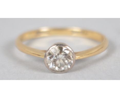 A yellow and white metal ring set with an early brilliant cut diamond estimated to weigh 0.50cts. Colour: H/I Clarity SI1/SI2