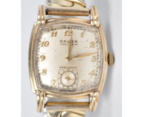 A gold plated wristwatch. Cushion shaped dial signed 'Gruen Veri-Thin' ; champagne with numerical markings. Case reference: K