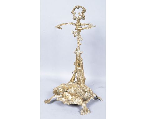 An antique style brass stick stand, embellishments with hunting scene, 56cm high