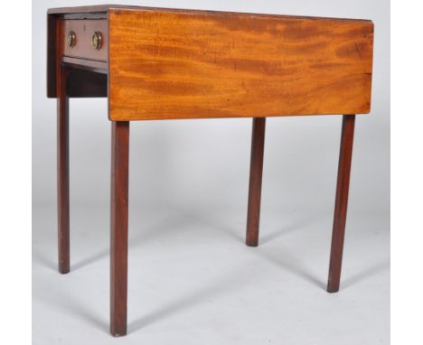 A Regency mahogany Pembroke table, the drop leaf top above a single drawer with ring handles and four tapering chamfered legs