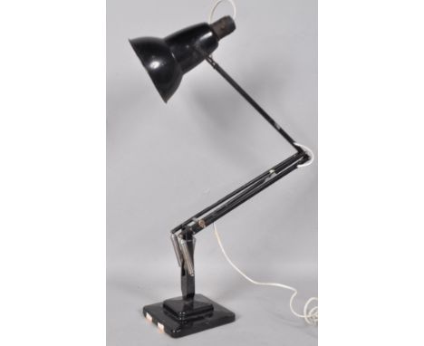 A Herbet Terry and Sons anglepoise lamp in black, 92cm high