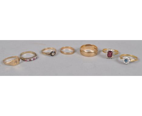 A 9ct gold 7.5mm domed flat wedding ring, hallmarked for London, together with six other rings, 9.6 grams of 9ct gold weighab
