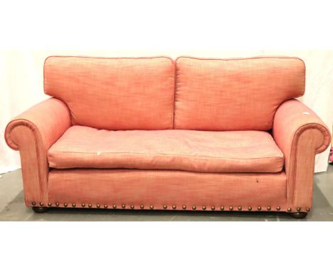 A contemporary two seat sofa with studs and upholstered in pink, L: 200 cm. Not available for in-house P&amp;P, contact Paul 