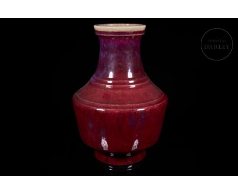 A beautiful vase with a circular mouth and a flaring neck that tapers slightly in the centre and expands at the shoulders, fo