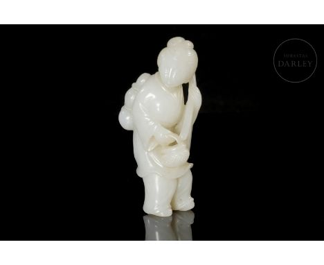 A carved white jade figure. It shows a woman standing, her back curved by the weight she is carrying, and her legs in motion,