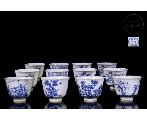 A series of twelve porcelain cups representing the ‘monthly flowers’ in underglaze blue. The scene on each piece begins at th