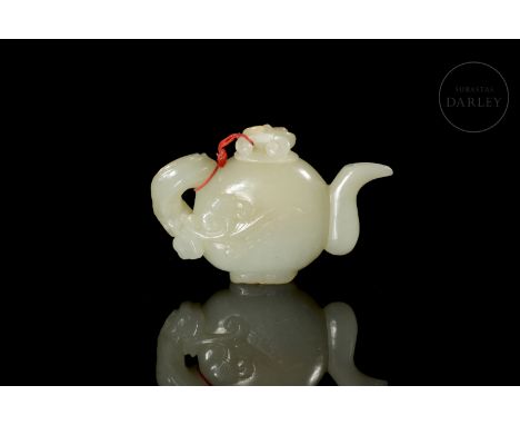 Light-coloured carved jade with subtle reddish-gold flecks. It has a narrow, elongated foot on which stands a globular body s