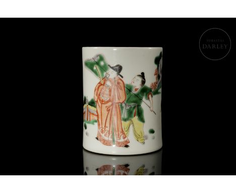 A moulded porcelain vessel with a circular base and a cylindrical body with an underglaze white background. The exterior show
