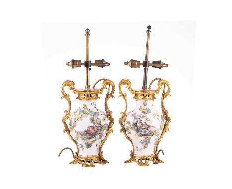 A pair of 18th-century style Meissen porcelain baluster vases, late 19th century each with ormolu mounts painted with reserve