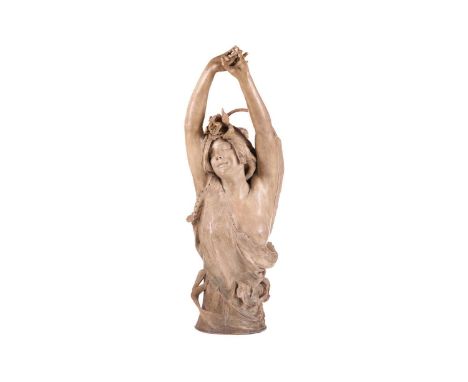A large Art Nouveau earthenware figure, in the manner of Goldscheider, formed as a semi-nude female maiden, her arms stretche