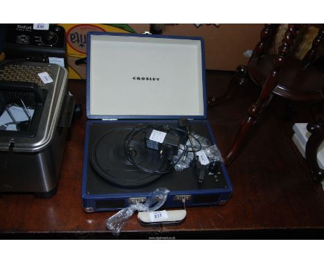A "Crosley" cased record player.