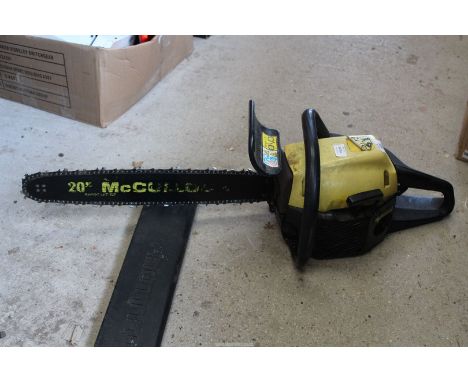 A "McCullock" Chainsaw  20" cutter bar and good chain brake.