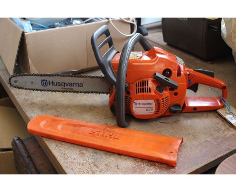 A "Husqvarna" 236 Chainsaw with 13" cutter bar, chain brake works, with good compression.