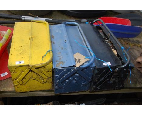 Three cantilever tool boxes with contents, screws, spanners, etc.