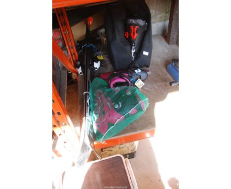 A pair of ski boots, size 328mm, a pair of roller boots (multi size 4 - 7) and a pair of Kennedy freestyle skis (173 cms).