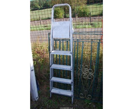 A 5 rung aluminium step ladder.