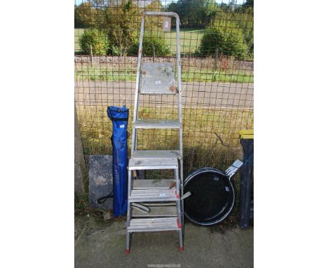 A 5 rung aluminium step ladder and 3 rung step ladder.