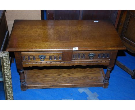 An Oak side/telephone table with two drawers and a lower shelf, 3' wide x 18" depth x 20" high.