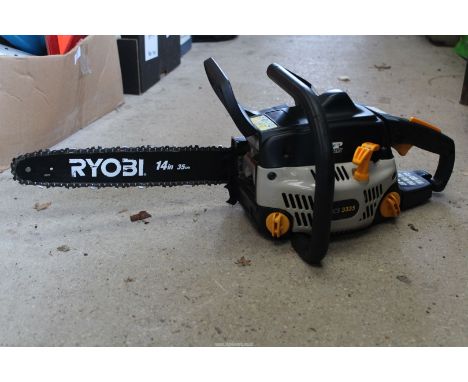 A "Ryobi" Chainsaw with 14" cutter bar, chain brake working and good compression.