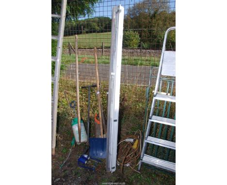 A strip light 6' wide diffuser plus a foot pump, snow shovel, garden tools and a sprayer.