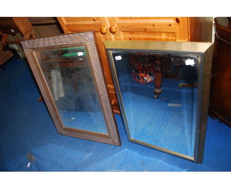 Two gilt framed BP mirrors.