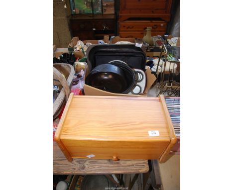 A bread bin, enamel meat dishes, cake tins, etc.