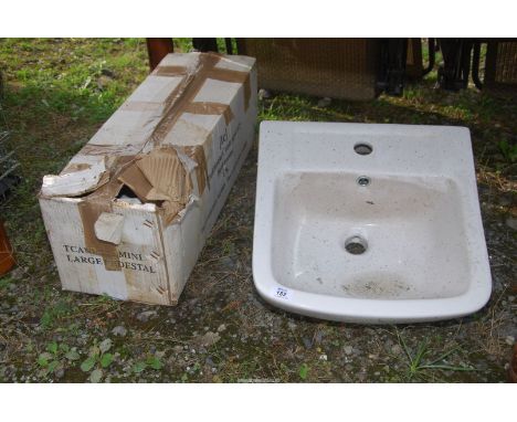 A pedestal basin.