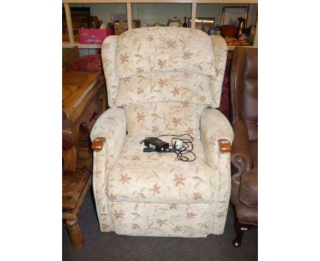Celebrity rise and fall electric reclining chair in light floral pattern fabric