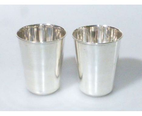 Pair of silver beaker cups, stamped 900AG, 3.9oz.