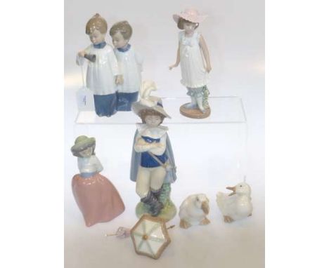 Four Nao figures and two Nao ducks
