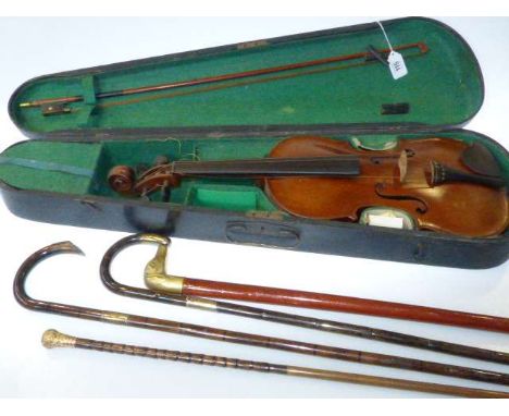 Sea fishing rod, four walking sticks, two with silver mounts and cased violin and bow