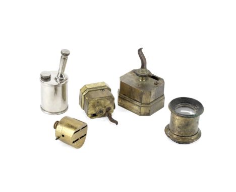 A Group of Bloodletting Instruments,comprising: three brass scarificators, together with a brass ocular and a medical leech l