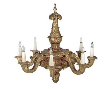 A large late 19th century Italian carved and giltwood and painted eight light chandelierthe carved and turned acanthus leaf s
