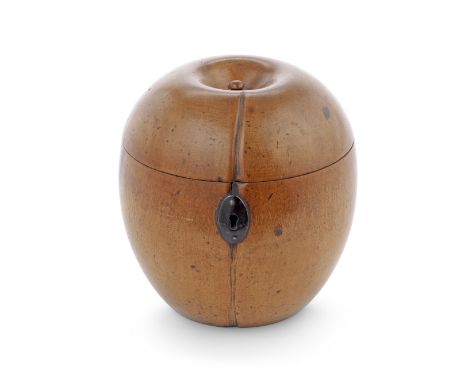 A 19th century fruitwood apple tea caddywith metal hinge and escutcheon, the cover with short slightly curved stalk, 12cm hig