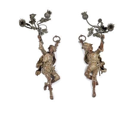 S. Kinsburger (French, 1855-1935): A pair of unusual late 19th century brown and green patinated figural twin light wall appl