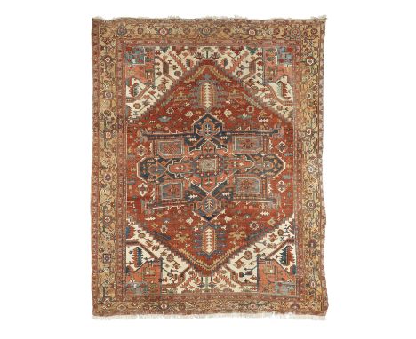 A vibrant Heriz carpetNorth West Persia,375cm x 300cm approximatelyFootnotes:Please note that this lot is subject to the US e
