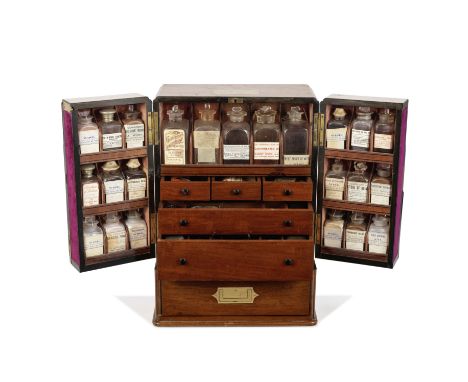 A Large Mahogany Medicine Chest, English, mid-19th century,the well-stocked chest with double doors opening to twenty-three g