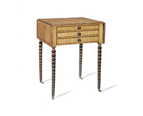 A Regency birds' eye maple, purplewood line-inlaid and ebonised Pembroke work table1820-1825, with three long graduated mahog
