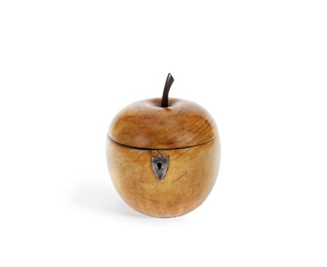 A 19th century fruitwood apple tea caddywith metal hinge and shield shaped escutcheon, the cover with slightly curved stalk, 