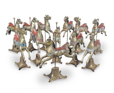 Attributed to Arthur Ernest Anderson (d. 1936) of Bristol: A set of twelve carved and polychrome wood carousel juvenile gallo