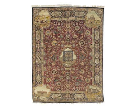 An antique Tabriz carpetc.1930, North West Persia, signed Kali Baffion deep madder ground, the central medallion and each cor