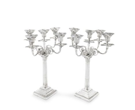A pair of Victorian silver five-light candelabraCharles Boyton, London 1890 With four ornate leaf embellished and floral scro