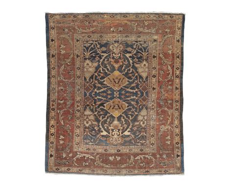A Zeigler carpet, possibly reducedNorth West Persia,with rich madder border and indigo ground, the whole with interlacing pal