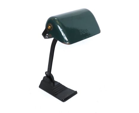 A 1930's German desk lamp by Dr Ing-Schnider &amp; Co. with cast iron base, wrought iron stem and dark green lacquered shade,