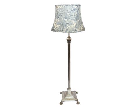 An early 20th century English silver plated brass telescopic lamp standard with corinthian column, with contemporary blue pri