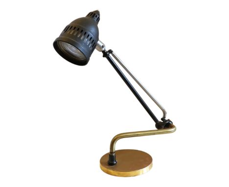 An early 20th century English brass, nickel and ebonised steel dentist's lamp, of adjustable form, with holophane lens, c.191