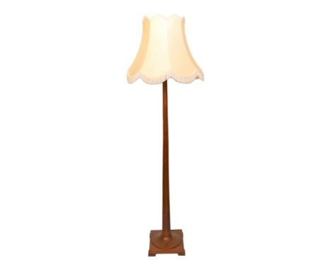 A 1930's English wooden lamp standard with vintage shade, height to bulb holder 160cm

&nbsp;
